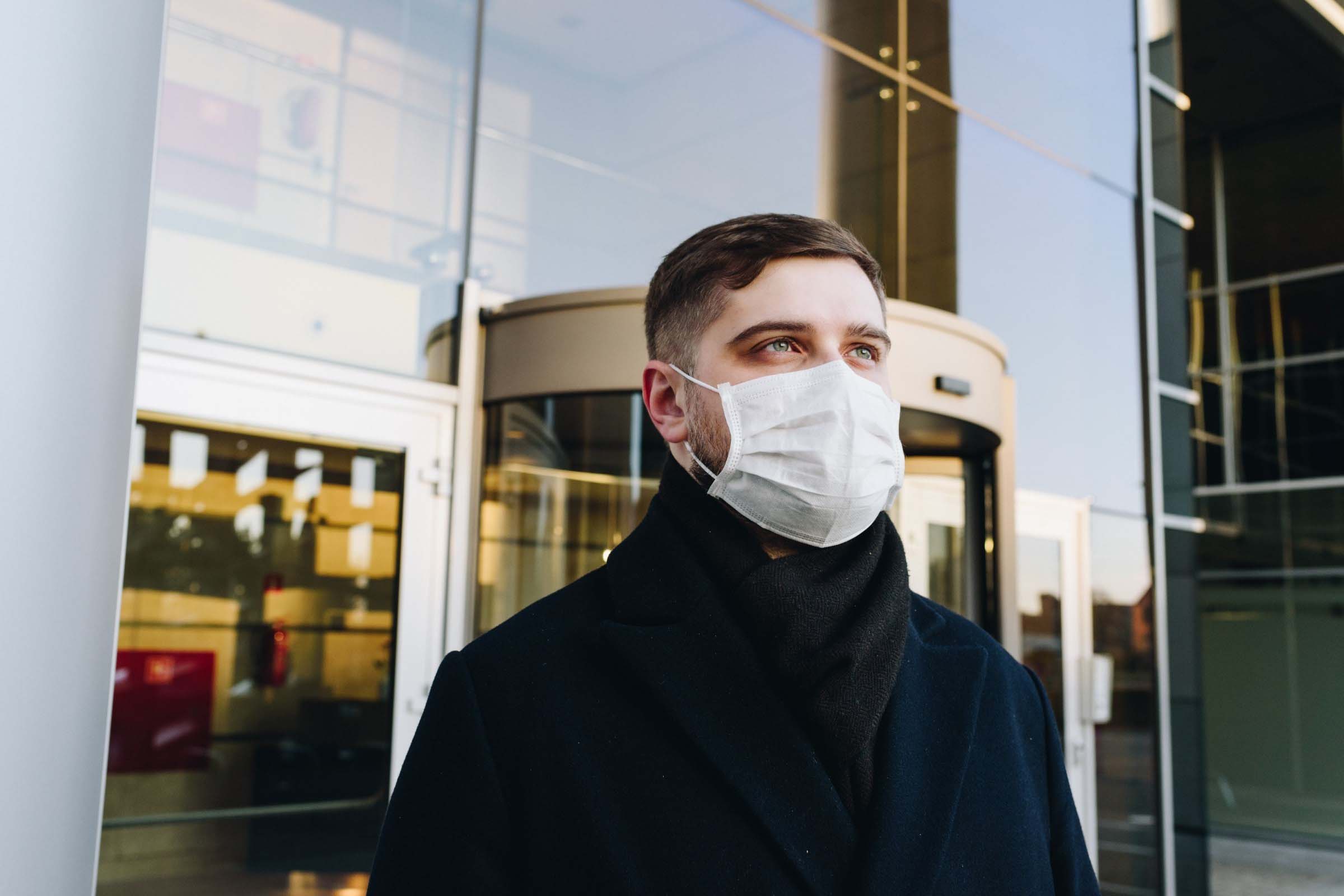 business leader shown with a facemask during the coronavirus times